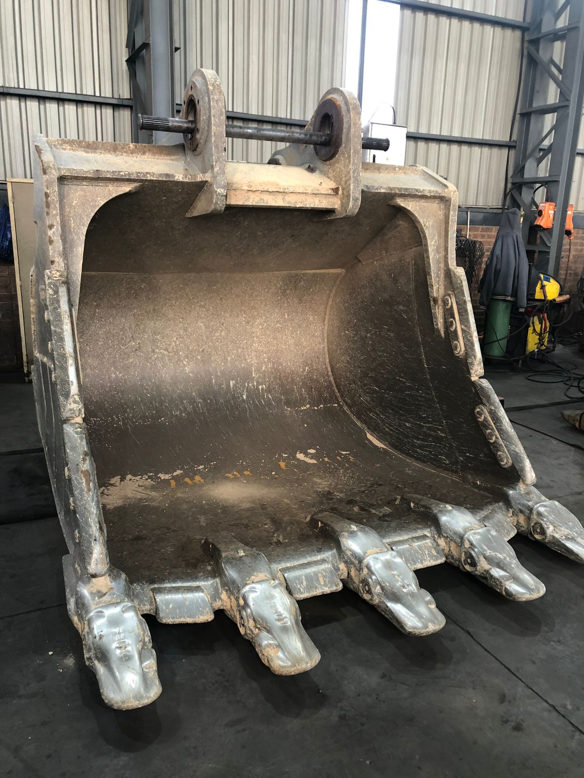 Excavator bucket before